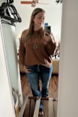 This sweater got lots of compliments. It was comfortable; it fit well, and the color was perfect. It is "oversized" so it's not fitted and has the cute drop shoulder. It's a bit bulkier in the back, but I could tuck it in the front no problem. I could have sized down, but I wanted the oversized look. I really loved it. - Erin G.