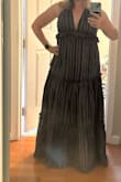 Ordered this for beach photos. I ordered a size down based on other reviews, but it was still too big. I liked the colors and style, but the fit was off so had to return. Just fyi, it is basically backless, in case that affects whether you would want it or not too. - Sarah S.