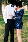 We ordered this dress for a school dance for my daughter. We originally went with Medium but sent it back and got Small, which is her normal size. We would say it fits true to size, and, even though it's form-fitting, it is very flattering and doesn't fit snugly. We were very happy with how classy it looked on her! - Heidi C.