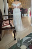 The dress didn't flatter me. I wasn't a fan of the colour but the details were very beautiful. It is decently heavy - Lara K.