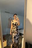 This dress was stunning! The fabric was so smooth, and the dress overall fit really well. I'm short so this dress was a bit long. I had to get it taken up at the bottom and the straps. - Morgan S.