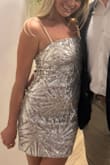 Runs a little large so it's not like a bodycon, but it still fit nicely. Comfortable! The sequins were not itchy at all. - Cassidy H.