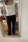 This top is perfect! Fits just like the photo. The sweetheart cut is so cute and flattering. It adds a classy touch to a regular outfit. Would definitely recommend! Wish they had it in black too - Danielle G.