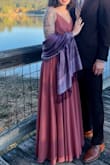 Got it to wear to a fall wedding and it was great! The color was slightly darker than it looks on the website but it was perfect for me. Fits true to size and has adjustable straps which is nice. I wore it with two inch heels and it was just brushing the ground. Overall just good quality and a lovely dress! - Sarah B.