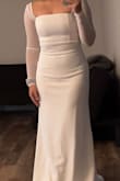 It fits great. I'm not wearing heels in this picture so it is a little long and has a little train-like thing in the back bottom. Overall, I loved it and it came really early as well. - Dalia M.