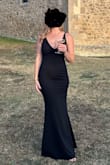 This dress was perfect for a black tie wedding I attended. The material is on the thicker side but it didn't feel heavy. Perfect for dancing and was also comfortable to sit in during dinner and speeches. I love how much you can do to add your own style to this dress too! - Beatrice C.