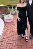 The dress was seriously stunning especially when I wasn't moving lol. I feel like any time I had to get up or walk anywhere, I was readjusting the neckline/the off-the-shoulder part. The rubber part that is supposed to help keep the dress up, would sometimes show. But coincidentally, it stayed on through a heck of a good time on the dance floor. So all in all I would rate it 8/10! - Loren S.