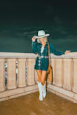 I bought multiple denim dresses as I'm pretty small and all denim clothing often doesn't fit great but this one was by far the most flattering! Was snug around the waist to help not make it not boxy and wasn't too short! I got a ton of compliments at the concert we attended! I highly recommend it! - Cheyanne S.