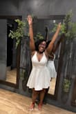 Fits perfectly! I love the way I look in it. I'm thinking of getting it in black. - Nodi-Lee H.
