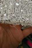 The bottom of the dress has loose strings and lost many sequins in the bag when I took it out of the package. - Laura A.