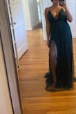 I think this dress was made for tall people. I'm 5'4", and even on my tippy toes, the dress is still so long that I could trip on it. It is a gorgeous dress though! - Julie W.