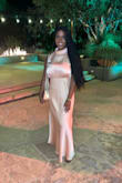 The material was absolutely beautiful, silky, and smooth. I received compliments all night. The color is so complementary! Very comfortable fit. No need for alterations. - Diondra B.