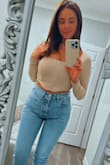 I love this top. I bought it on a whim and it turned out to be so cute and flattering with a pair of high-waisted jeans that I just bought it again in black. - Melissa V.