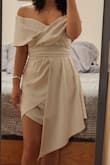 It was out of stock when I was first looking for elopement dresses, but I'm so glad it came back and tried it out. You MUST try it on with it fully zipped and hooked to really see if you like it. I didn't the first time and didn't care for it, but I loved it the 2nd time when I did (see both photos). It is really hard to zip up at the thick waistband, so multiple hands are needed! It's a champagne color, easy to steam, and super flattering, especially at the chest for those that are smaller. Received so many compliments, and I can't wait to wear it again for other events! - Jamie L.