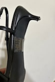I absolutely love this shoe. My only problem is the heel caps came off the ends of the heel after one day of wearing it. - Vanessa M.