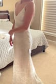 First, I was very surprised and pleased at how well this fits. I don't need any alterations or tailoring. I'm earing this for my beach wedding. It's light, beautiful, and makes me feel beautiful. - Bary R.