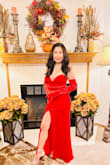 The color is beautiful and the style is classy. It's a head-turner. Everyone at the ball I went to complimented me and my dress. However, the wire in the chest area looks weird in the middle part, it almost looks like it is protruding. The gown somewhat rolled down when I was dancing so I kept on pulling it up. The dress is also long for a 5'2" woman. I paid $50 to get it hemmed which is ridiculously expensive. - Theresa B.
