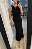 What a great dress. Fits perfect in all the right places. Initially thought it was a little snug getting it on, but then realized there was a zipper on the side. The material is heavy enough for it to be warm and hide imperfections. I'm able to wear it without a bra, which is a nice feature! Tried on with 4" & 3" heels, and the length is perfect. - Jennifer J.