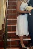 The fit was just right. The only adjustment I had to make was at the hem. It was far too long for me. - Noemi S.
