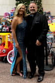 Bought this dress for a formal charity event. Loved the color, style, and fit. The glitter on the dress gets everywhere though. But it made for a sparkly night. The slit on the side was just a little too high for someone 54 years old but a couple of margaritas took care of that. - Eric D.