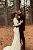 This dress was absolutely perfect!!!! I did have a seamstress put a loop to bustle but it took 1 loop and hooked right on the bottom button. It was stunning, smooth, and absolutely so comfortable!!! - Emily S.