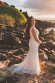 This dress came in and was absolutely beautiful for my wedding!! - Sara C.
