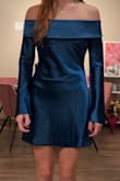 I loved the dress. However, I got my normal size (an xs), and there is an elastic around the top of the shoulders that doesn't allow me to move at all. [Bearable] but wouldn't make the same mistake. It is a beautiful dress, but don't make the same mistake if you want to be comfy and have broader shoulders. - Lillian W.