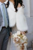 I wore it for my wedding day and absolutely loved it. Showed up beautifully in pics. Was concerned at first that it looked like something a teenager would wear, maybe not sophisticated enough. Tried it on again and fell in love.

It does have one sturdy closure. At first, I thought it didn't fit or lay properly on me, then I played around with it, moving it to the side, sliding a bit off the shoulder and it looked great all ways.

Wore it with a lace off-the-shoulder Lulus dress. Would definitely buy it again. - Christina V.