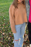 Very warm, even in 40-50ish degree weather! Comfortable and flattering. A little cropped, so I would wear it with high waisted jeans. I recommend! - Erin H.