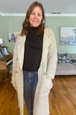 This sweater jacket is comfy for cool weather, such as jeans and a top,  but stylish as well, as I even used it as a coat for a formal wedding. It is also so soft and makes me want to snuggle up on the couch with it :-) I would definitely size down. I am usually a M in Lulus, but I ordered a small and it is still roomy. - Anna S.