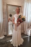Wore it for my wedding!!! I loved it and got sooo many compliments on it! Make sure you put the dress on first before you get your hair and make up done because it does go over your head! But besides that, I'm in love with it! - Stacy B.