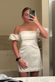 I loved this dress online but it just didn't flatter my body well. I felt a little boxy in it. Definitely think it runs a little big. The sleeves are adorable and the dress is very high quality - Amy A.