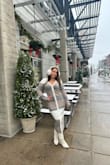 I love this sweater dress so much! It's stylish, comfy and warm! I suggest sizing down as it runs a little on the large side. Boots are from Lulus too (: - Madeline R.