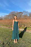 I really enjoyed wearing this dress for a fall wedding! Fits true to size, is comfortable, and flattering. It had adjustable straps and I didn't need to wear a bra. The only minor thing is the different layers of the dress were slightly lopsided. Not sure if it was cut incorrectly? It wasn't that big of a deal, but I ordered two of the same dress to compare each layer was crooked on different sides. - Marla W.