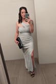 I bought this dress for a military ball, and it was perfect! I did have it altered since I'm pretty short, and I had a few stitches put in the side slit as it came up too high. I am 5'2" and 145 lbs. I bought a medium, and it was snug but fit exactly how I pictured it. - Holly S.