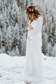 This dress made me feel so stunning, and it was so simple and perfect. A little thin for my snow wedding, but I wore leggings beneath and was overall fine. Bra wasn't necessary, and the dress was still covering my chest. Complimented my 15 week bump well! It was the perfect length for this tall girl, and you couldn't even tell I wore hiking boots below! It got muddy and I didn't sweat it for a second because it was a steal of a deal. So many compliments. So lovely. BUY IT. - Caitlin F.