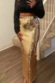 This skirt is an absolute show-stopper. I'm a bit short so, instead of it being midi, it was a full-length skirt. That didn't take away from the look at all. Love it! - Meisha P.