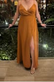 This was tight around the bust but light and flowy beneath. It was such a pretty color on me, once I had a tan. I wore it out to dinner for a friend's b-day on vacation, but it can easily be dressed up for a wedding guest dress. - Lindsey G.