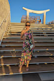 This dress is so beautiful, with bright colors, great material, very light (doesn't weigh at all), and fits perfectly! It's definitely my favorite dress now! - Taty T.