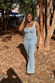 Like someone else said, if you're short, the straps will be large and not sit directly on your shoulder. It kinda stains easily (I wore it to a football game and had under-boob sweat stains), but overall I like it and received compliments. Aside from that, I have absolutely no complaints. - Daezha B.