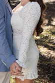I loved this dress for my engagement photos! I will absolutely be wearing it again for my bridal shower. It's the perfect dress for any season, hugs the curves so nicely! With the tie-back closure, it can grow or shrink with you. The length was sexy but not too scandalous. - Sara M.