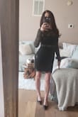 I have the bell sleeve version of this dress in a medium from several seasons ago and loved it. I'm a pretty solid small to extra small now, so I ordered this one in small. The body of the dress fits well, with a little extra room, but the sleeves are like trying to squeeze limbs into a tube with no stretch, at least a full size or two smaller than normal. - Heather C.