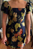 Looks super pretty - as pictured. Fits well, true to size. Little loose in the back but I have small boobs so don't fill it out. My friends and family love it. - Nina I.