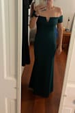 This dress fits really very and it very flattering. It is a little darker shade of green than the photos and it ended up not working for the event I was planning. But still a beautiful dress! - Sarah S.
