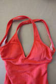 I really wanted to love this piece, but it's wrongly sewn - it's tangled, and the straps don't cross straight. No matter how many times my husband and I tried to detangle - it's just wrongly sewn!!! I have never seen anything like that. Unfortunately, I bought it on final sale for $29, and my only option is exchange - however, my size is sold out. I think I'll have to give XS a try as I'm not going to keep this piece. Very disappointed!!! - Lidia R.