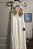 This dress is made with great quality fabric. It's thick and beautiful. It's a great dress for me to wear in Hawaii. - Marshala C.