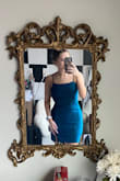 I love how simple but fun the dress is! It can be dressed up or down and fits perfect! There is stretch, and the material doesn't feel scratchy! - Katelyn T.