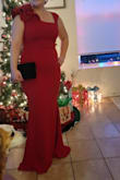 As soon as I tried this dress on I knew it was the perfect dress for my husband's Christmas military ball! This dress is stretchy and hugs in all the right places. The material was thick enough to be warm in the cold and comfortable. I would recommend still wearing a bra or nipple covers due to some showage. It was a little too long for me even with heels that I did need to hold the bottom up when I walked so I didn't trip. Overall, I absolutely LOVE this dress and received many compliments! - Amanda J.