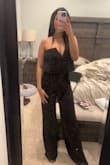 I loved this outfit so much! The one thing I didn't like was the pants were super long so I had to pin them to make them shorter, but other than that I loved the jumpsuit on me it was very comfortable too. - Macy M.