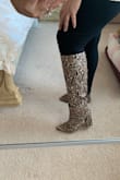 I sized up from 6 to 7. They are really hard to get in and get out of them. Even sizing one size up doesn't help much. The shaft is non-stretchy and this is the problem part for me. I have to ask for help to get out of them. They were final sale. Other than that, they look good. - Tanya S.